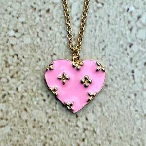 A Pink Heart Necklace: A Timeless Emblem of Love and Memories