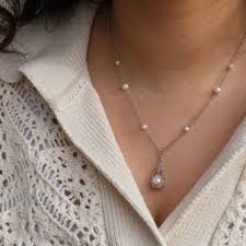 A Tiny Pearl Necklace: A Timeless Memory Keeper