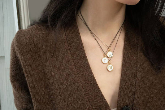 Cherished Connections: The Everyday Elegance of Initial Charm Necklaces
