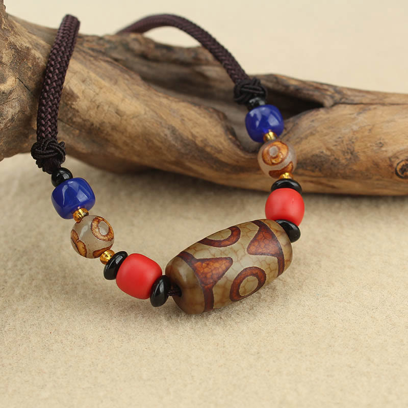 Pierres de Bouddha Perle Dzi tibétaine à neuf yeux Perle Dzi à trois yeux Colliers de protection Pendentif