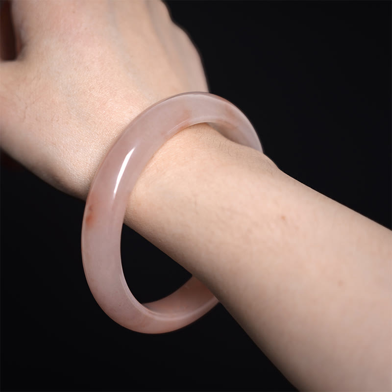 Bracelet jonc en jade et soie rose doré avec pierres de Bouddha