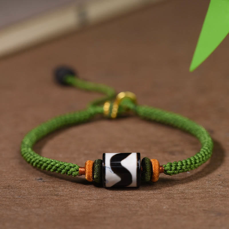 Bracelet de protection en corde verte tressée et perles dzi tibétaines faites à la main avec pierres de Bouddha