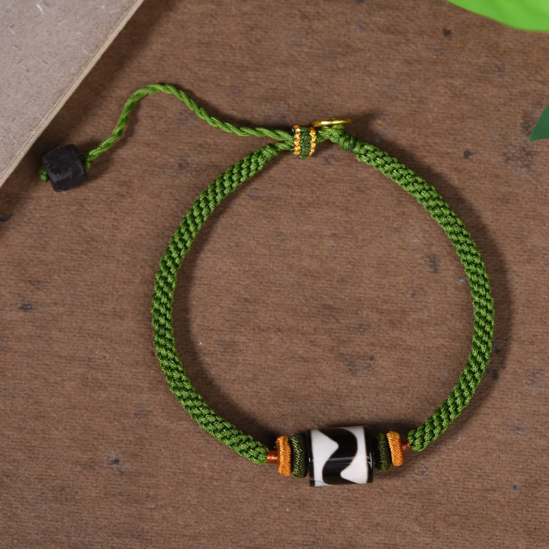 Bracelet de protection en corde verte tressée et perles dzi tibétaines faites à la main avec pierres de Bouddha