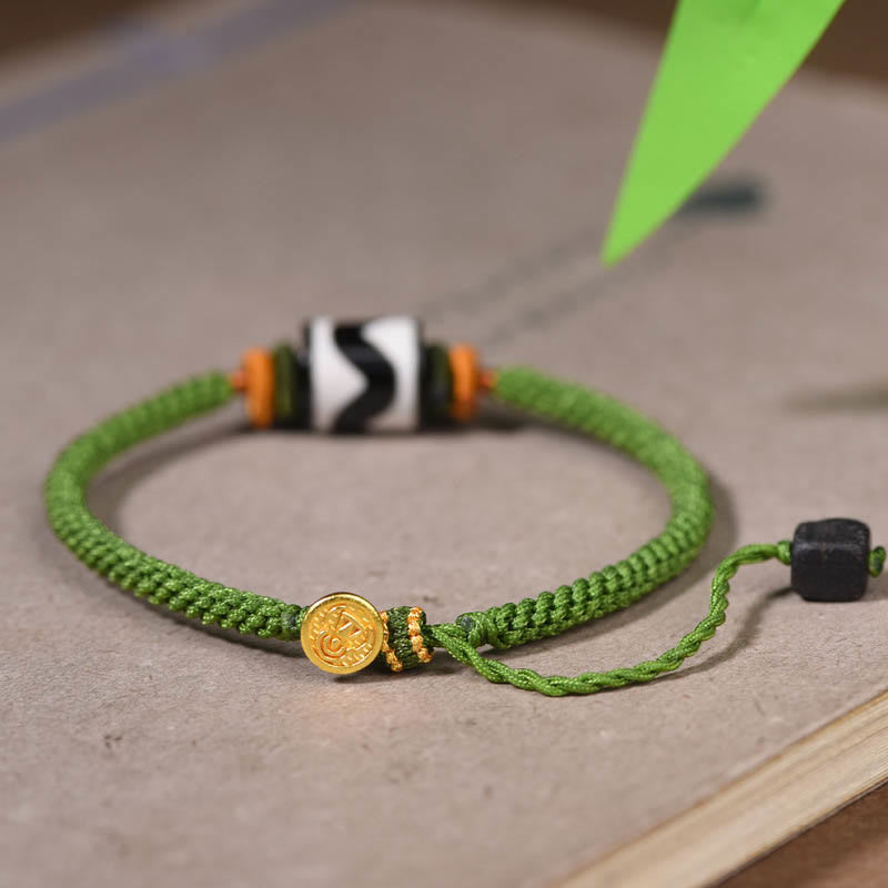 Bracelet de protection en corde verte tressée et perles dzi tibétaines faites à la main avec pierres de Bouddha