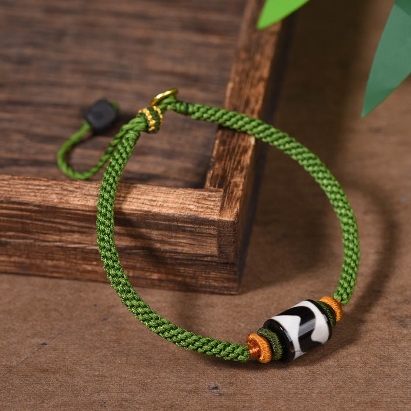 Bracelet de protection en corde verte tressée et perles dzi tibétaines faites à la main avec pierres de Bouddha