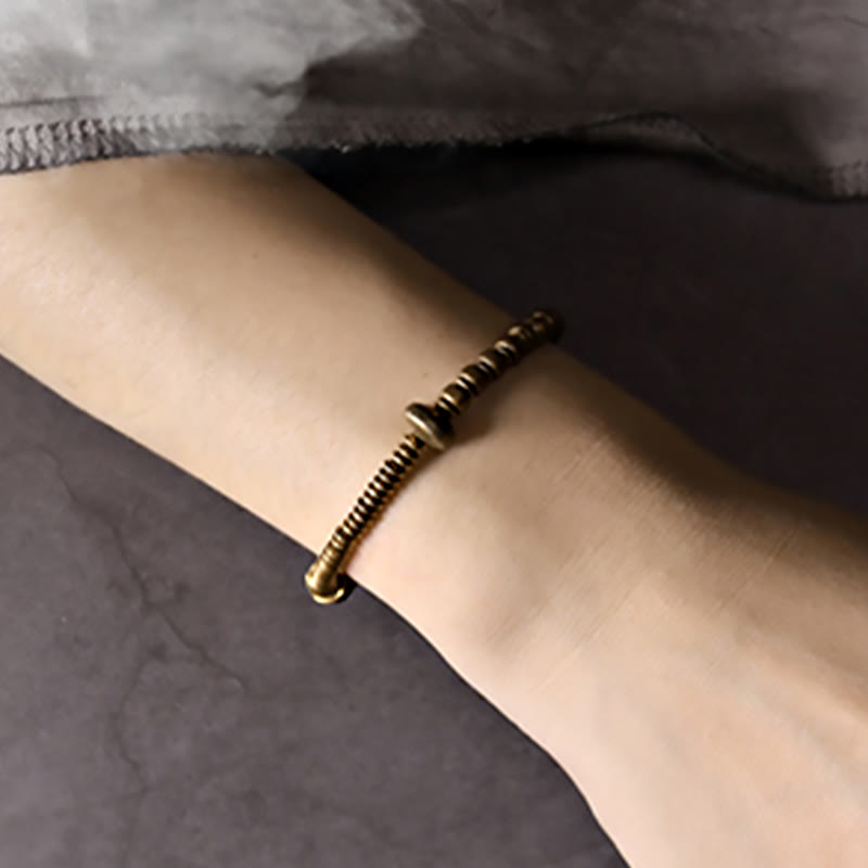 Bracelet en laiton et cuivre avec pierres de Bouddha
