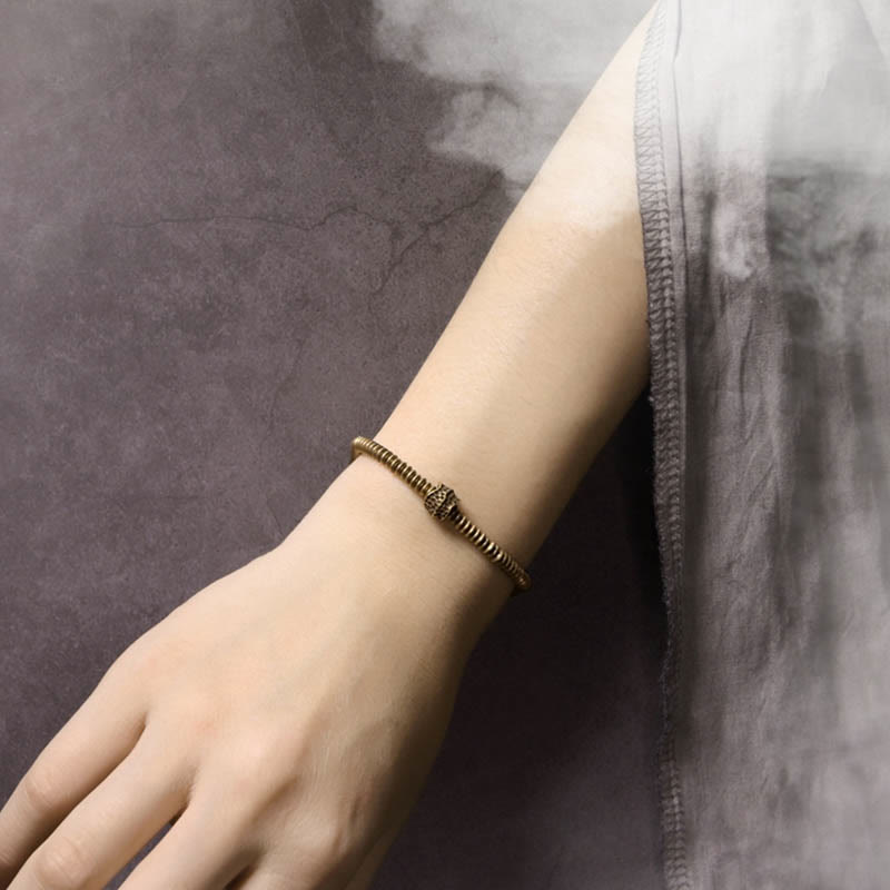 Bracelet en laiton et cuivre avec pierres de Bouddha