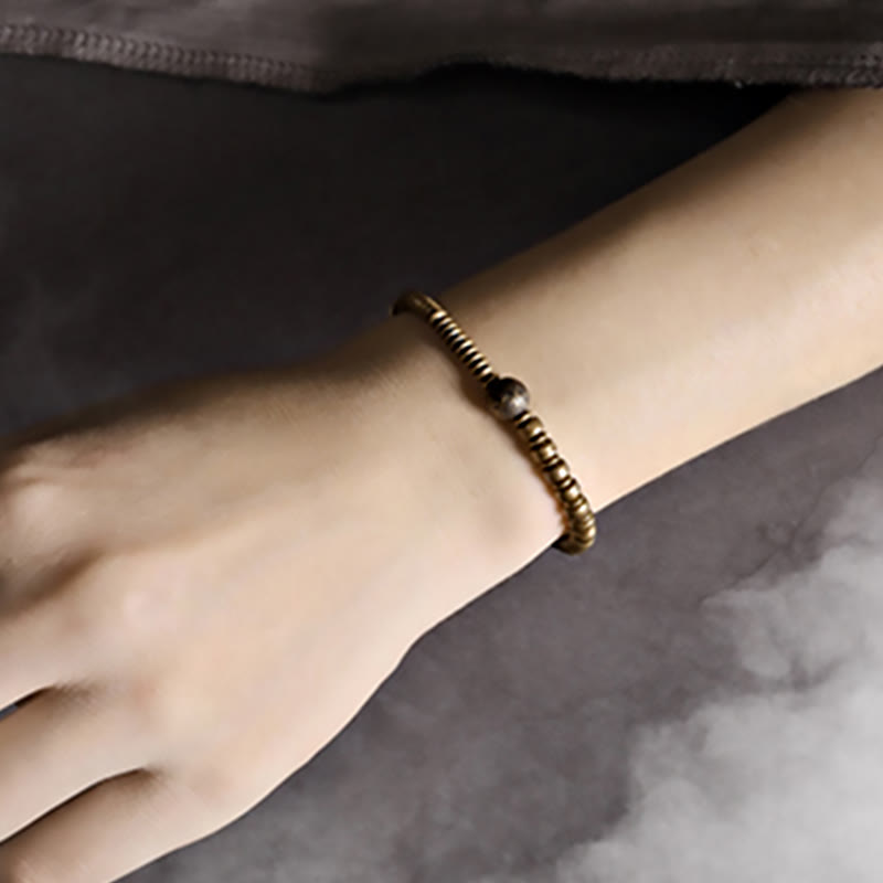 Bracelet en laiton et cuivre avec pierres de Bouddha