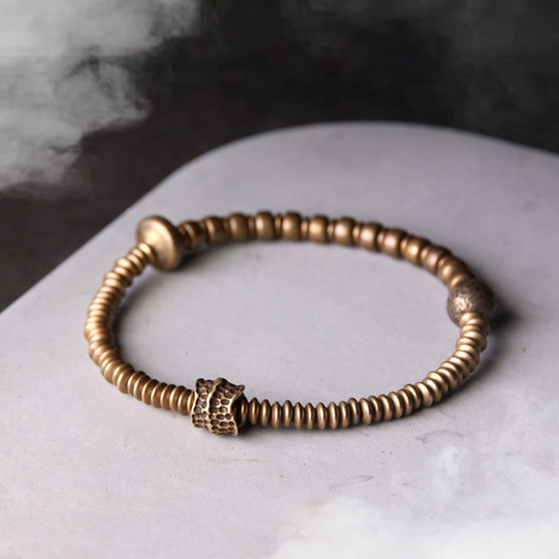 Bracelet en laiton et cuivre avec pierres de Bouddha