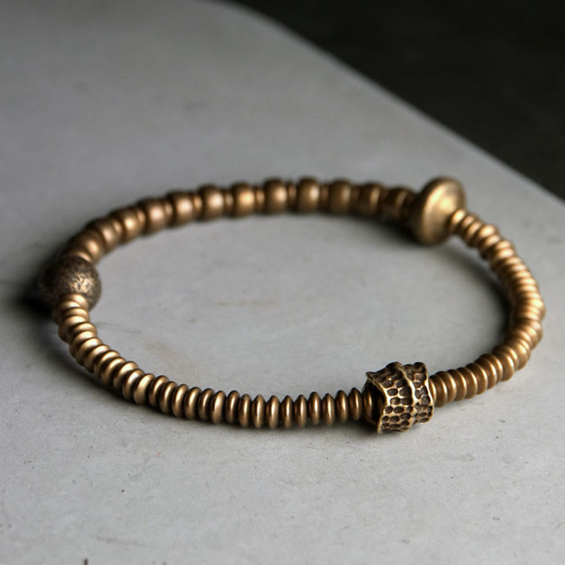 Bracelet en laiton et cuivre avec pierres de Bouddha