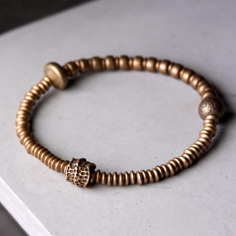 Bracelet en laiton et cuivre avec pierres de Bouddha