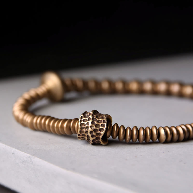 Bracelet en laiton et cuivre avec pierres de Bouddha