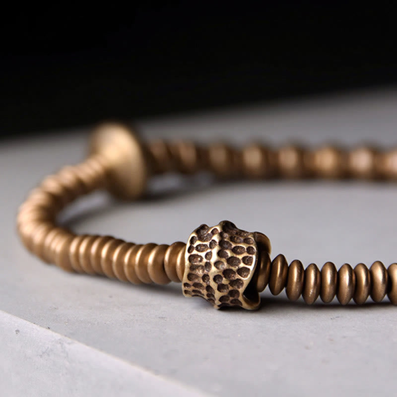 Bracelet en laiton et cuivre avec pierres de Bouddha