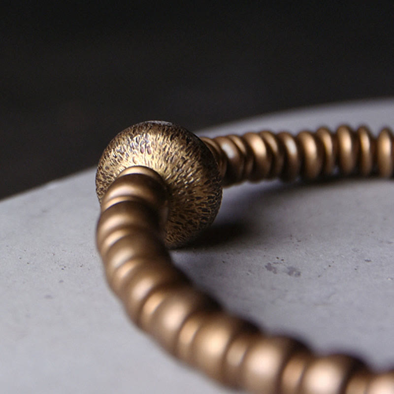 Bracelet en laiton et cuivre avec pierres de Bouddha