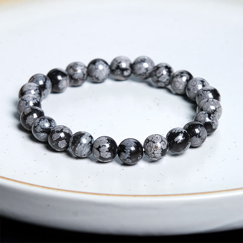 Bracelet d'équilibre en obsidienne flocon de neige en pierre de Bouddha