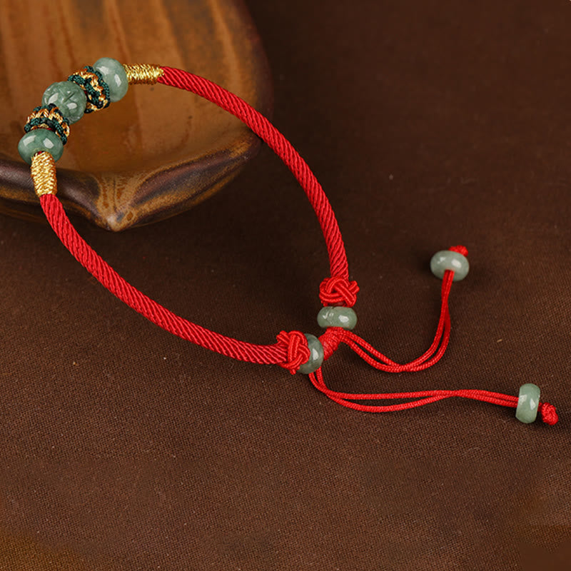 Bracelet en corde rouge avec perles de boulier en jade et pierres de Bouddha