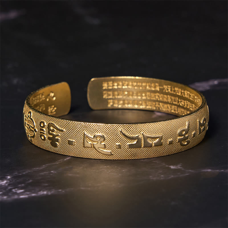 Bracelet porte-bonheur en cuivre et laiton avec six mots authentiques « Om Mani Padme Hum » et Sutra du cœur