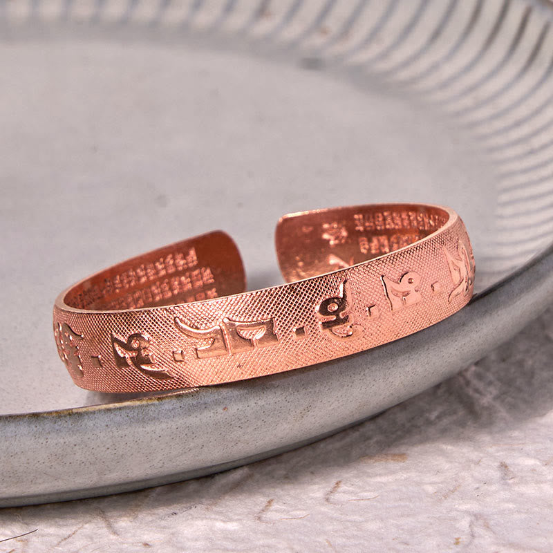 Bracelet porte-bonheur en cuivre et laiton avec six mots authentiques « Om Mani Padme Hum » et Sutra du cœur