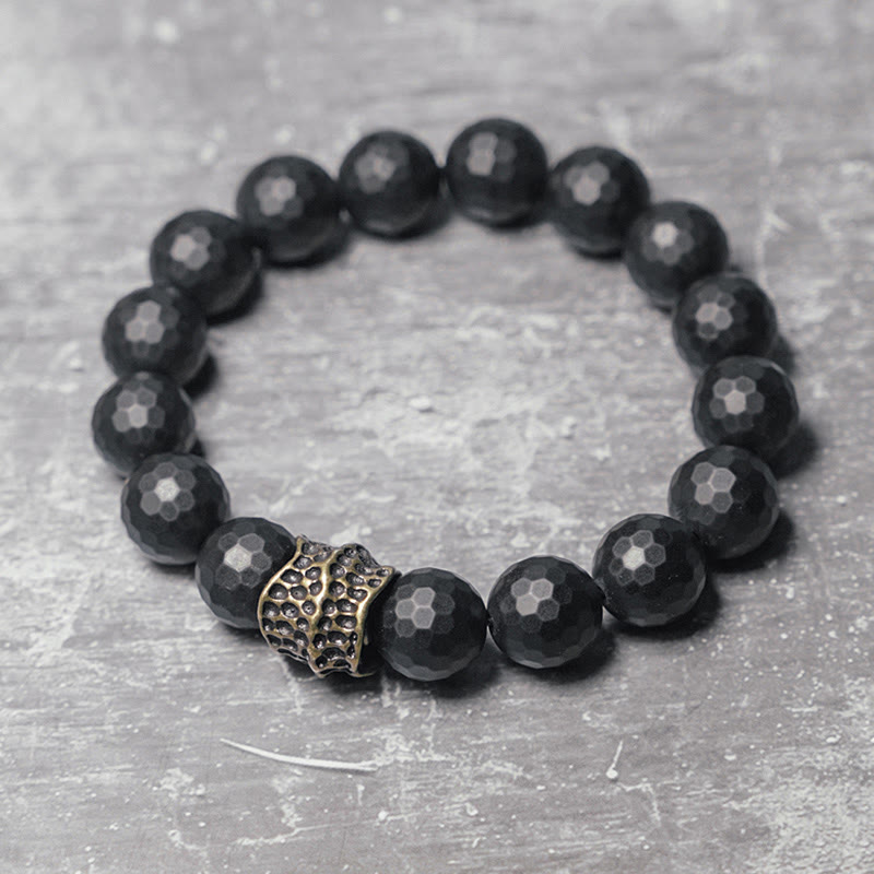 Bracelet de protection en cuivre et laiton avec pierres de Bouddha givrées mates et onyx noir