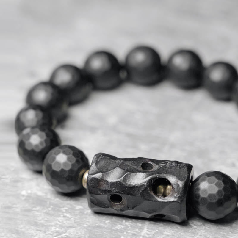 Bracelet de protection en onyx noir et ébène avec pierres de Bouddha et surface givrée mate