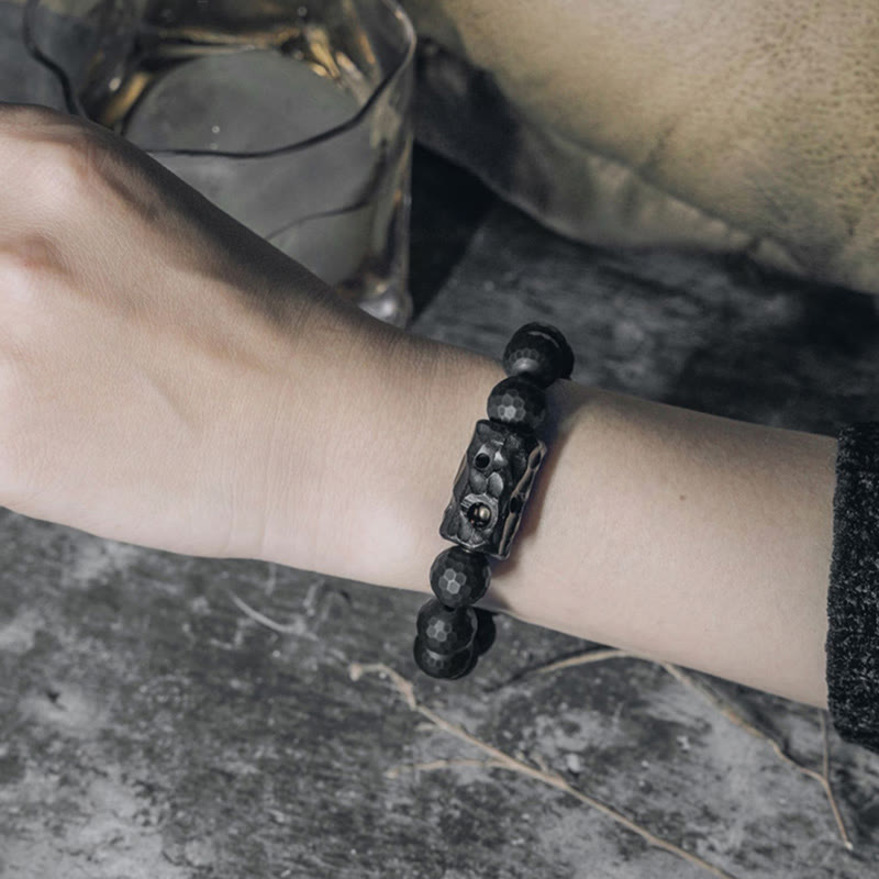 Bracelet de protection en onyx noir et ébène avec pierres de Bouddha et surface givrée mate