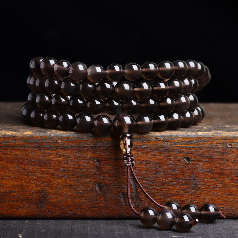 Bracelet Mala 108 perles en obsidienne noire et pierres de Bouddha