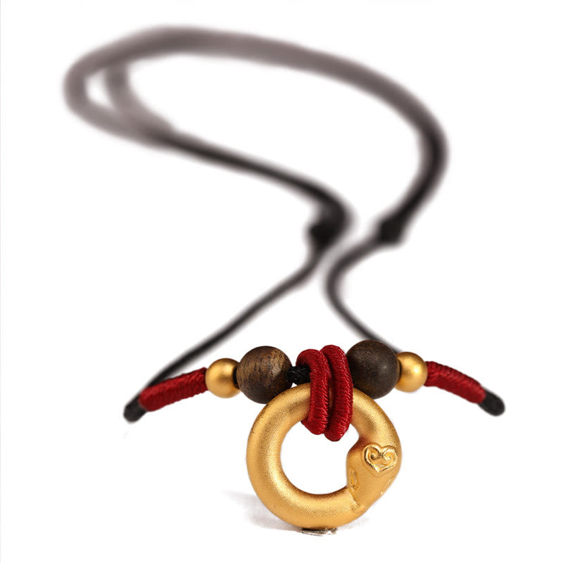 Collier pendentif en bois d'agar en or pur 999 de Buddha Stones, année du serpent