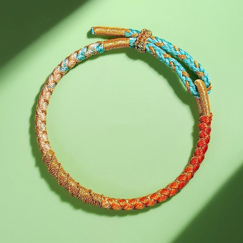 Bracelet tressé tibétain en fil d'or coloré avec pierres de Bouddha et nœuds en écailles de dragon