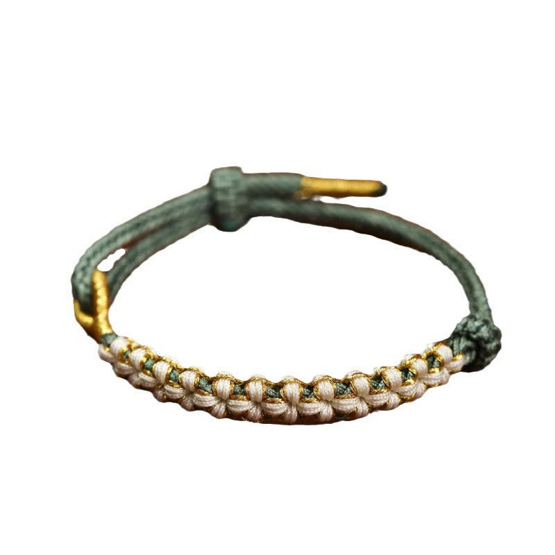 Bracelet tressé en fil d'or tibétain avec pierres de Bouddha et nœuds colorés en fleurs de pêcher