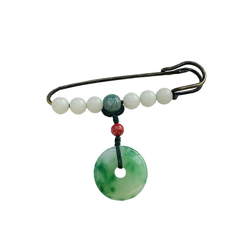 Broche porte-bonheur en jade et pierre de Bouddha