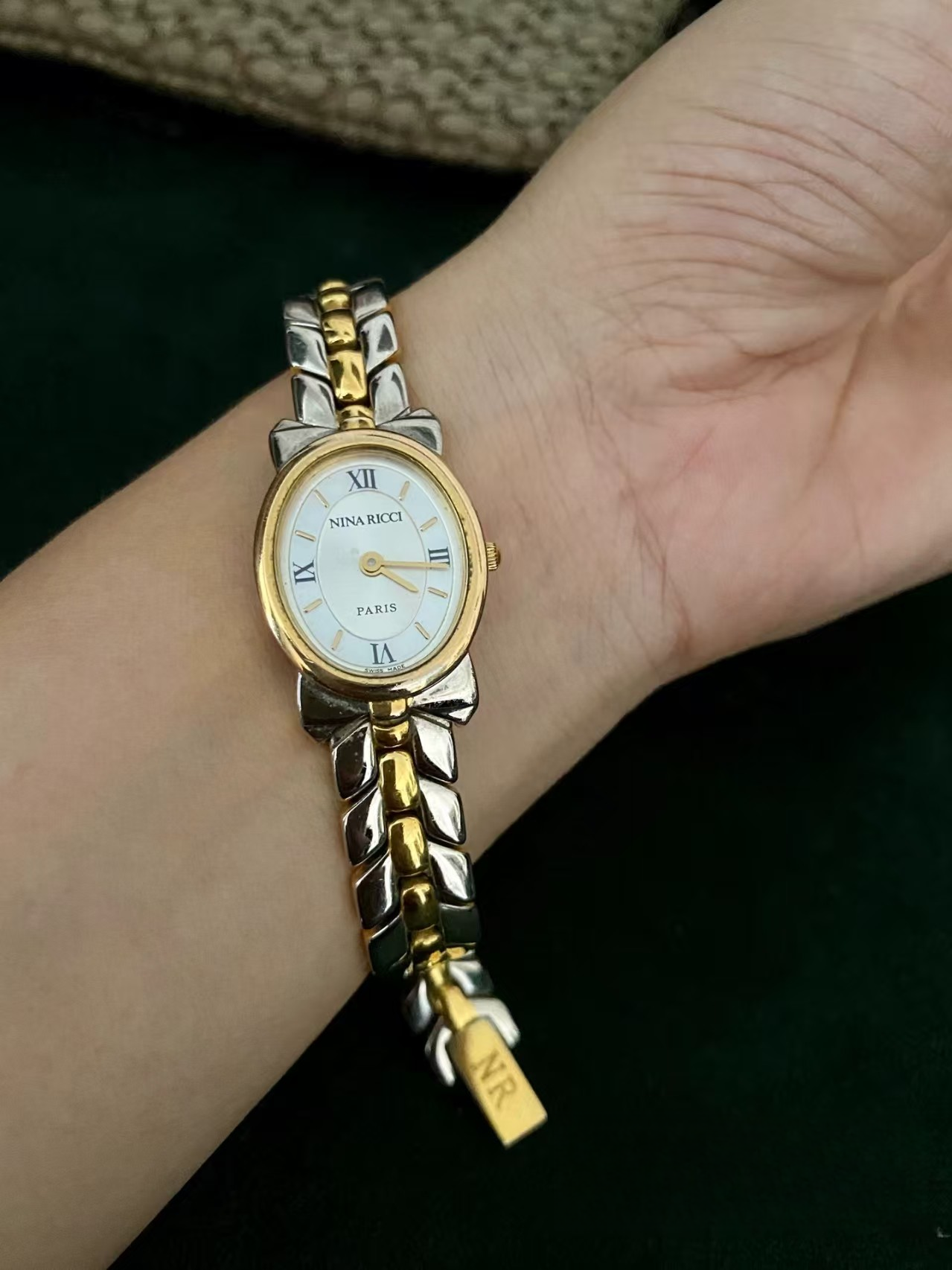 Montre vintage Nina Ricci Swiss Bow bicolore