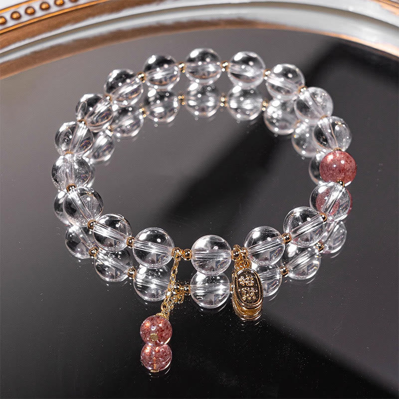 Bracelet à breloques en cristal blanc et quartz fraise de Bouddha