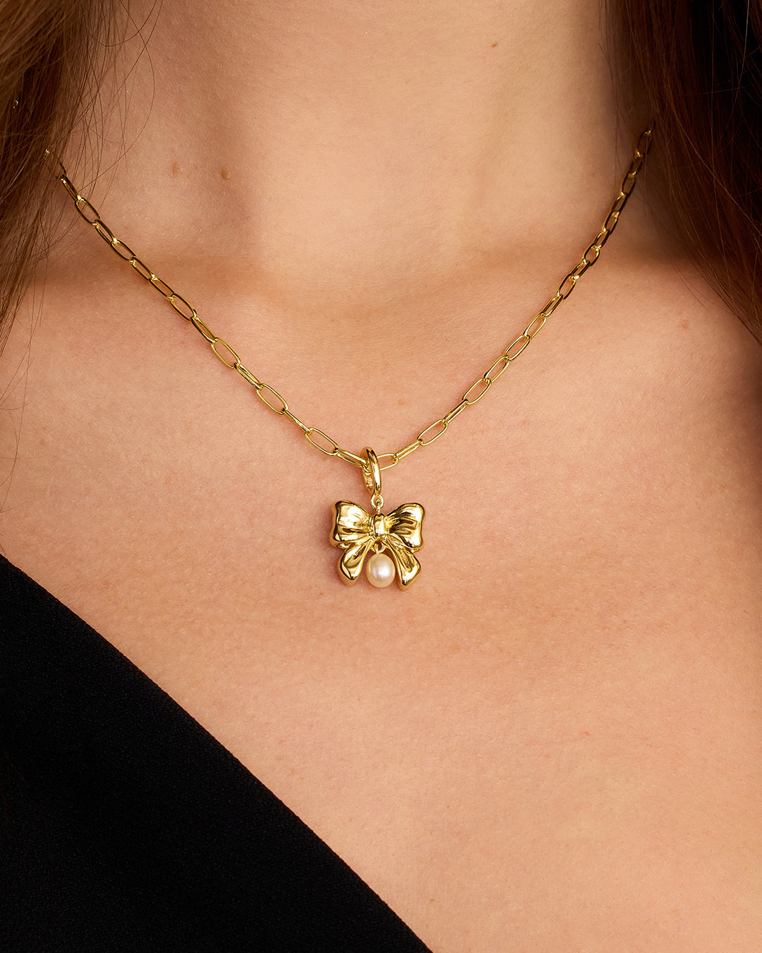 Breloque Parker en forme de nœud en perles