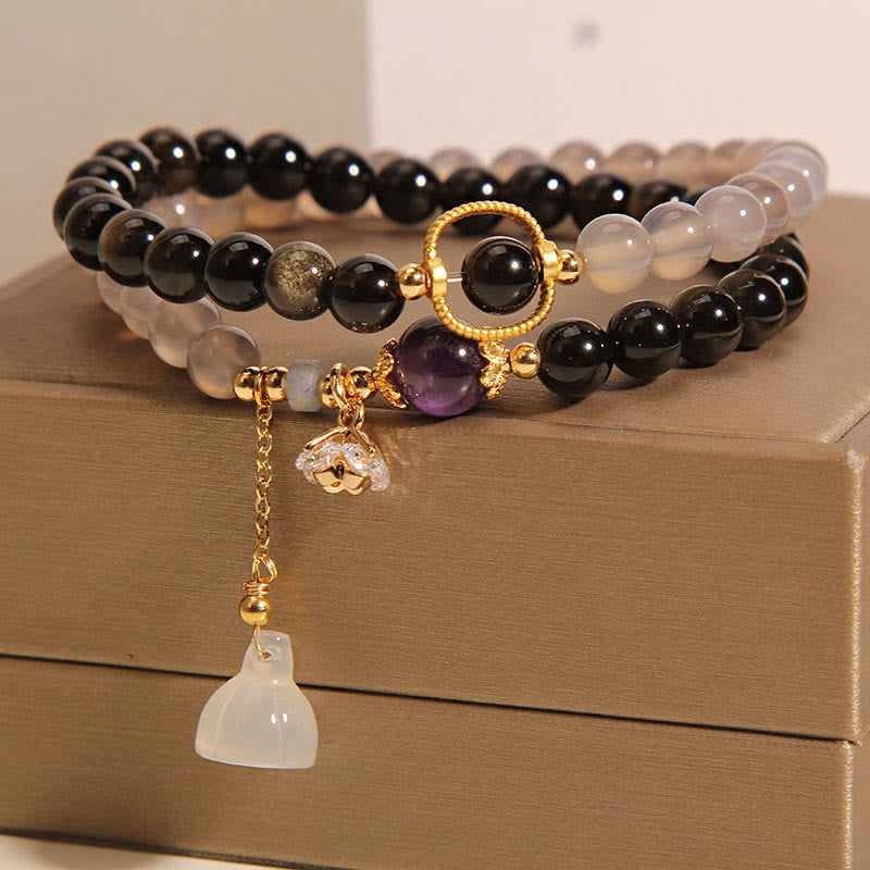Bracelet double tour renforcé avec breloque en obsidienne grise et agate et lotus