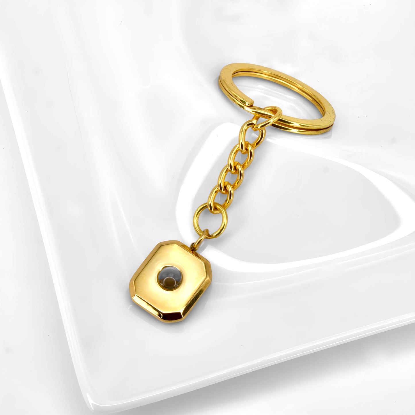 Porte-clés à projection carrée