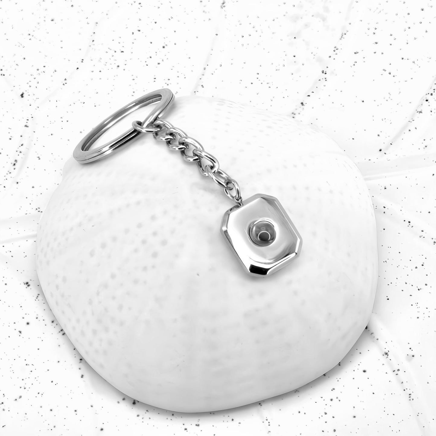 Porte-clés à projection carrée