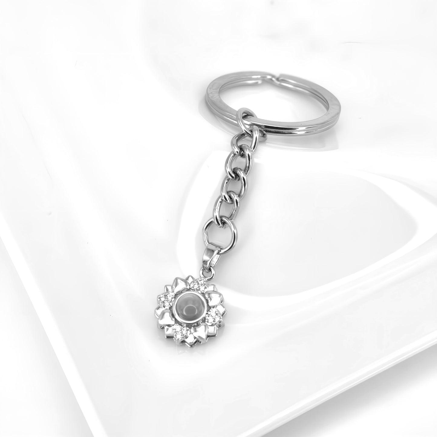 Porte-clés à projection de fleurs minimalistes