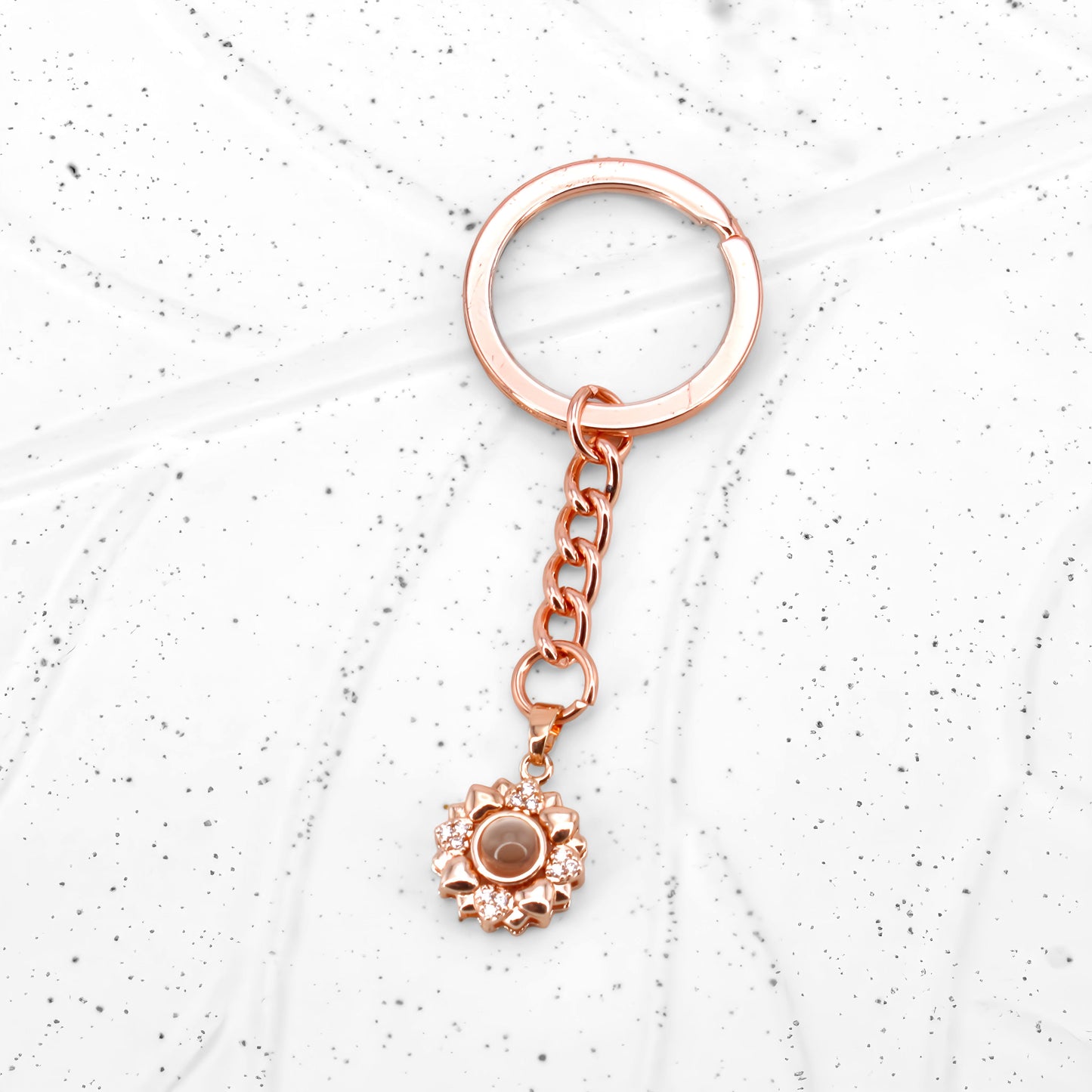 Porte-clés à projection de fleurs minimalistes