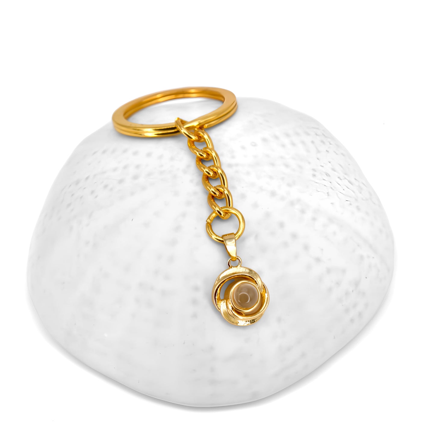 Porte-clés à projection tourbillonnante