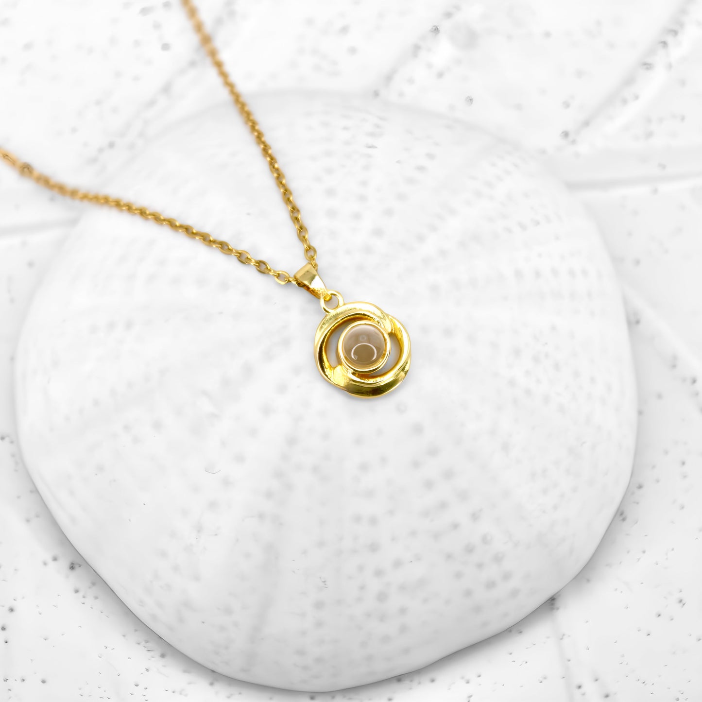 Collier à projection avec pendentif tourbillon