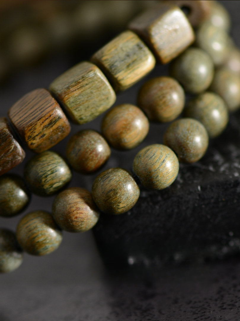 Bracelet de perles Dzi à deux yeux en agate de bois de santal vert
