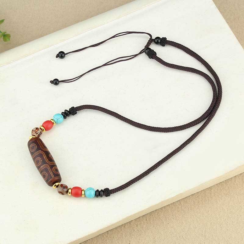 Pierres de Bouddha Perle Dzi tibétaine à neuf yeux Perle Dzi à trois yeux Colliers de protection Pendentif