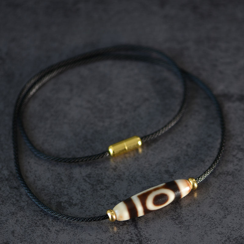 Pendentif en perle Dzi en agate, longueur 38 mm et largeur 11,5 mm, style aléatoire