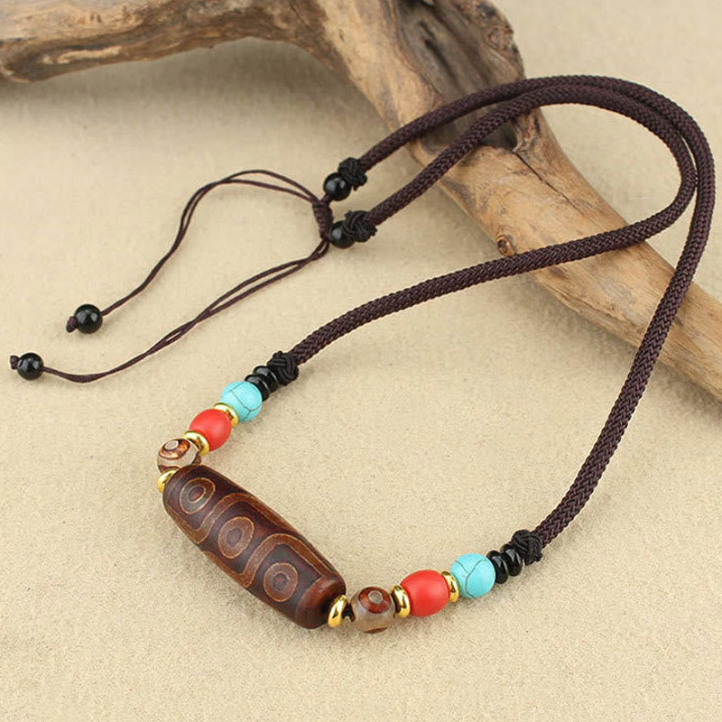 Pierres de Bouddha Perle Dzi tibétaine à neuf yeux Perle Dzi à trois yeux Colliers de protection Pendentif