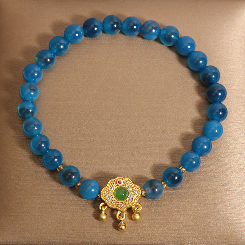 Bracelet de guérison à breloques en agate bleue et pierre de Bouddha