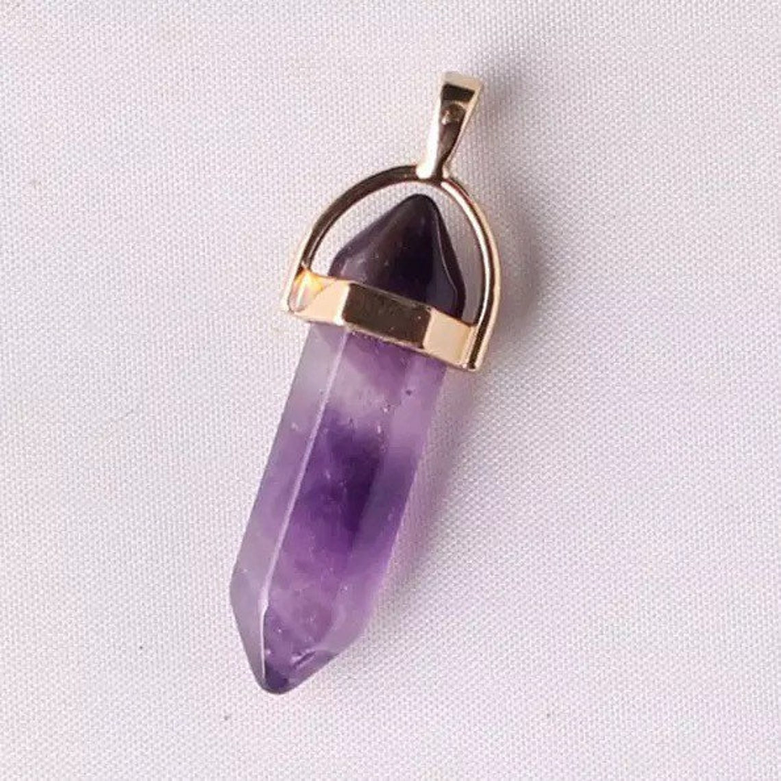 Collier à pointes de pierres précieuses