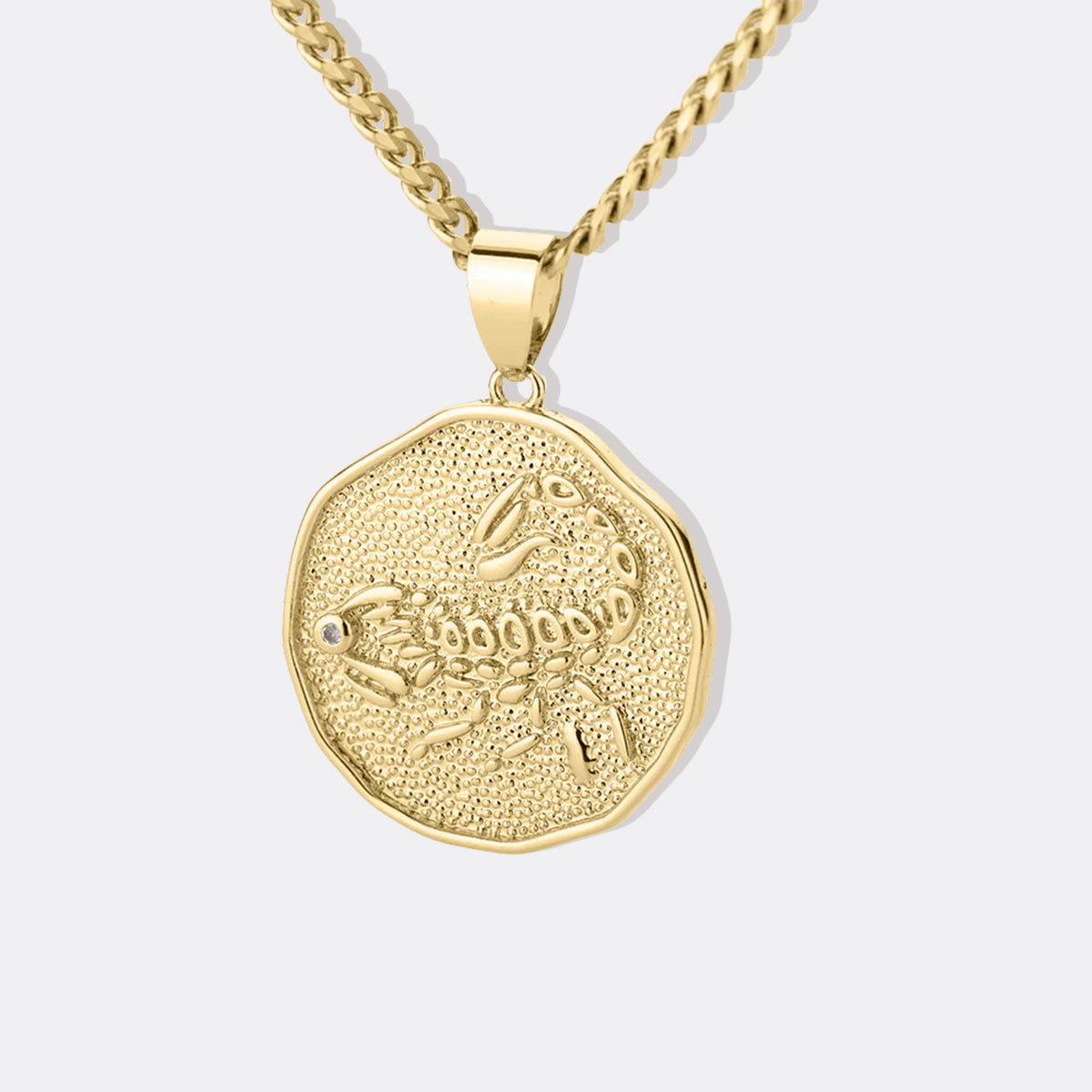 Collier avec pendentif en forme de pièce de monnaie représentant un signe astrologique