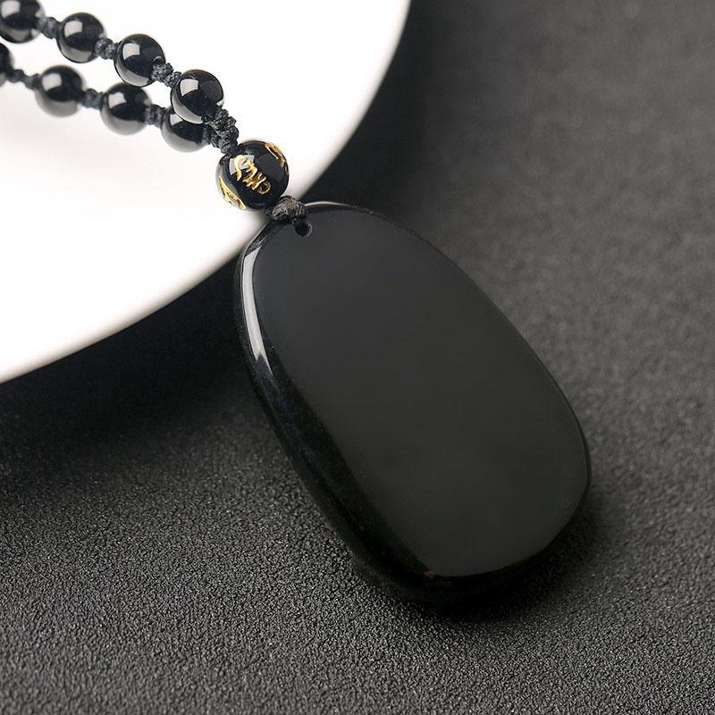 Collier pendentif Bouddha en obsidienne noire – Protection et courage