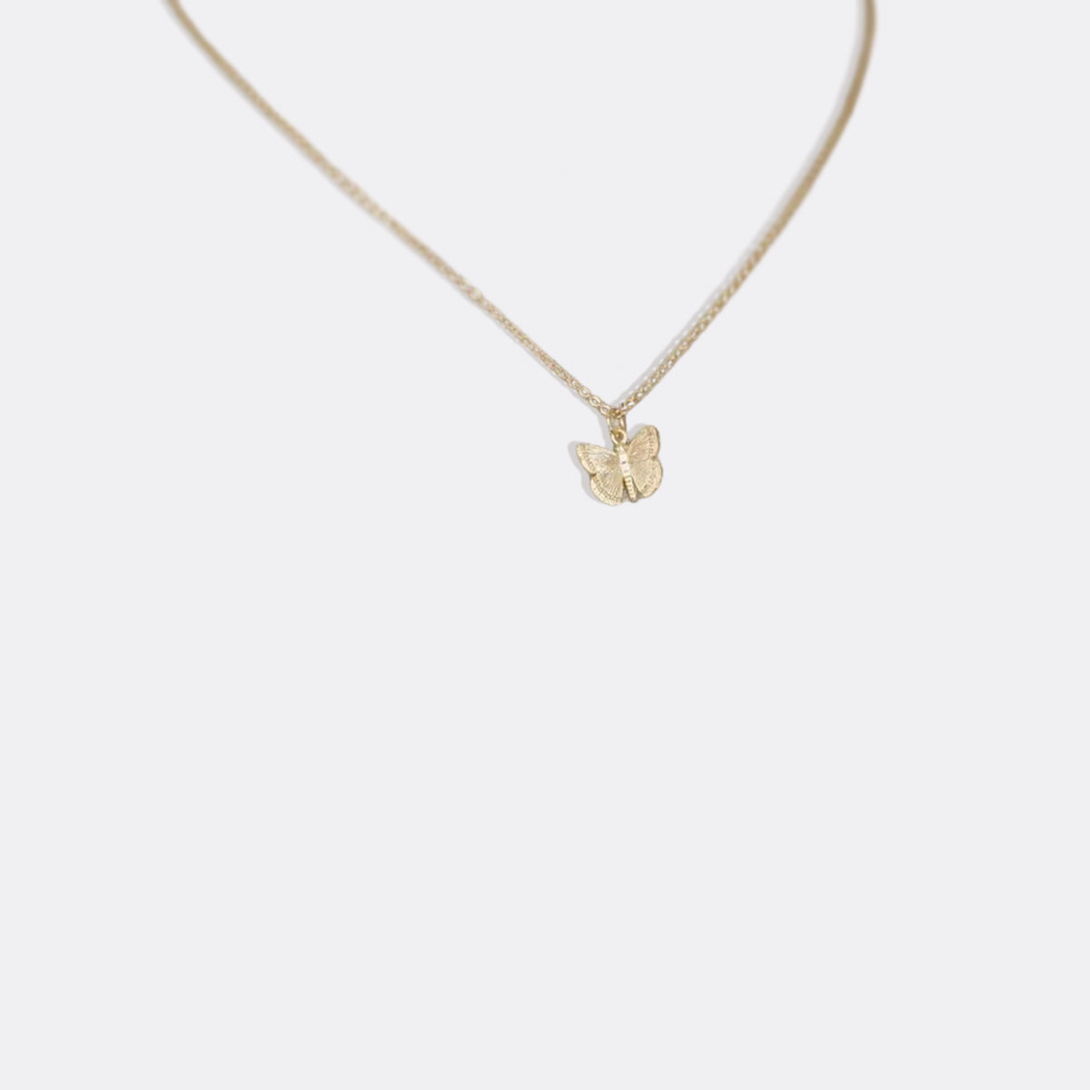 Collier pendentif papillon