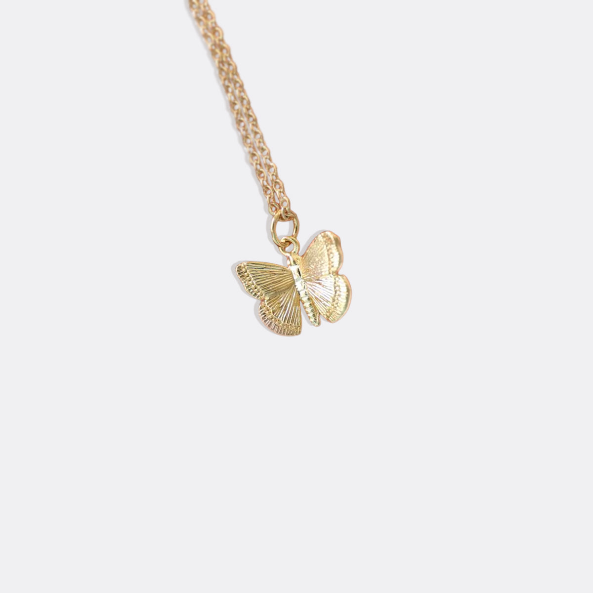 Collier pendentif papillon